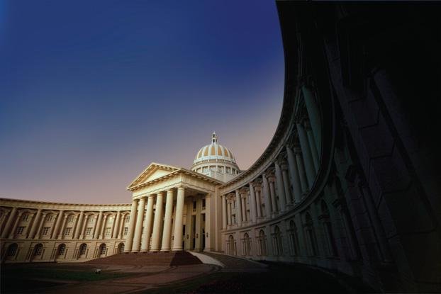 Modern apartment buildings with glass facades and a clear sky