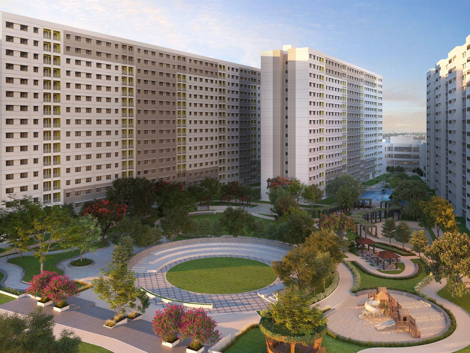 Exterior view of Embassy Lake Terraces showing modern architecture with lush greenery and towers